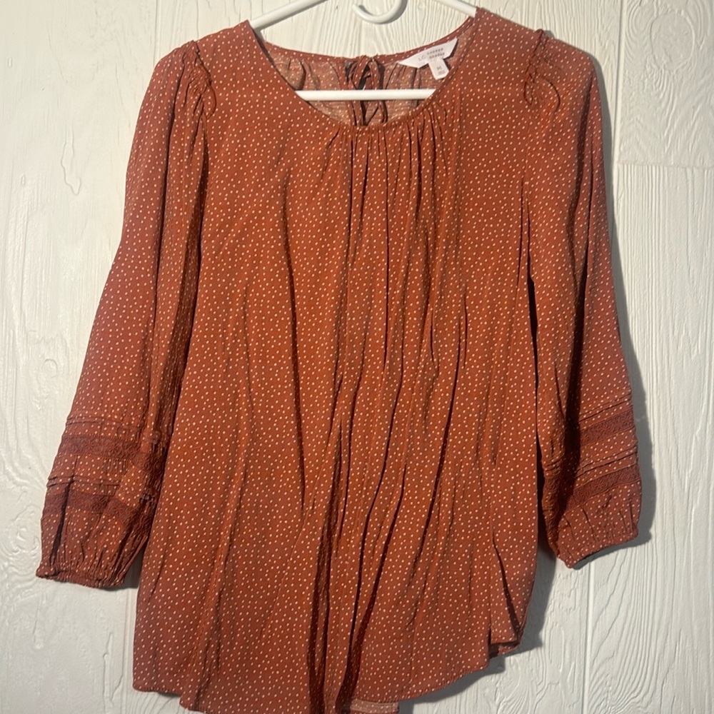 Orange polka dot blouse